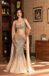 NAIRA-Champagne Gold Crystal Hand Embroidered Mermaid Lehenga with Shoulder Cape