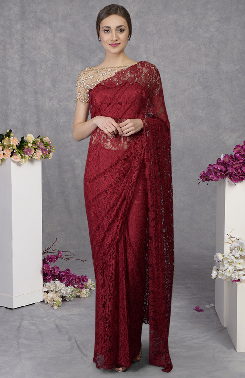 Maroon and gold deals lace net sari.